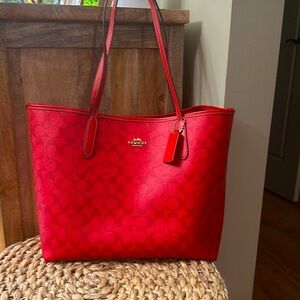 Coach tote reversible candy apple red with C monogram